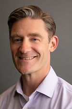 Headshot of John Skaritza